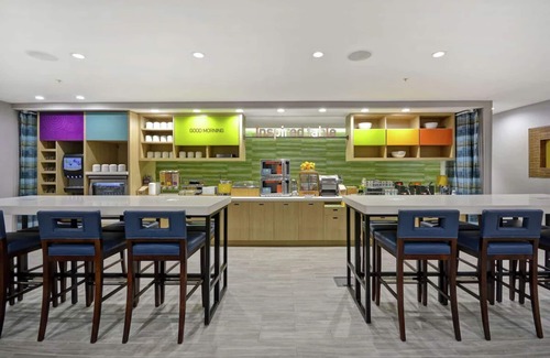 Alpine Center Hotel | Your Michigan Adventure: Minutes to Treetop Family Adventure. FREE Breakfast