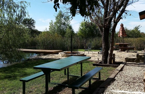 Fittstown Cabin | Your own private lakefront log cabin on a 1155 acre ranch.