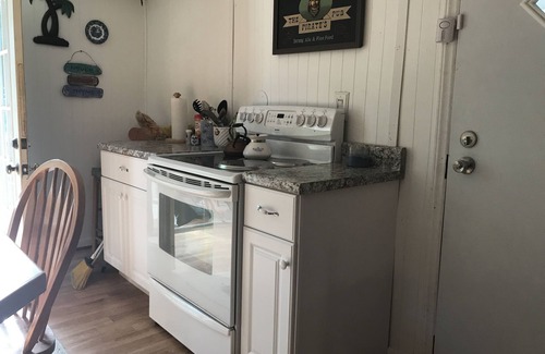 Supply House | Your perfect beach vacation home! Quiet neighborhood, sunroom, at beach in 4 min
