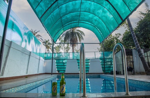 Khatri Park Housing Society Villa | Your private oasis awaits - a 4 BHK villa with a pool near the city."