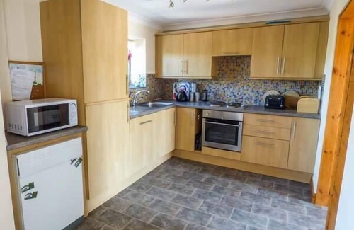 Rhyd-y-foel Cottage | YSGUBOR - BARN, family friendly, with hot tub in Betws Yn Rhos