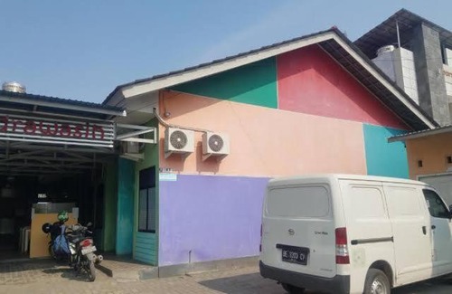 Gedongtataan House | Yudi kios burung