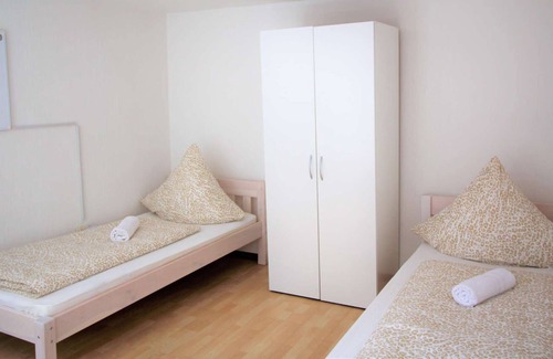 Zulpich Apartment | Z01 fitter's house in Zülpich center with open-plan living and dining area