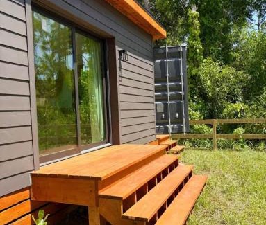 Estero House | Zen Container Tiny Home with Fenced-in Yard, Fire Pit, Centrally located and Pet Friendly