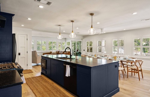 East Beach House | Zen-N-Sea offers poolside relaxation and near the beach entrance, sleeps 8