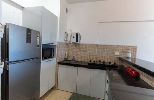 Kadadhe Apartment | Zen Retreat Calm 1BHK with Golf View, Fast Wi-Fi & Daily Cleaning – Pune
