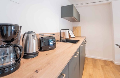 Speyer Apartment | Zentrumsnahe, Moderne Ferienwohnung "kaiserbleibe" mit Ruhiger Terrasse