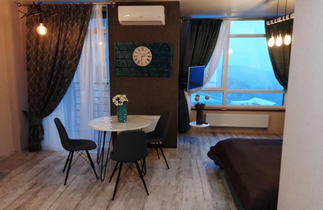 Уютная видовая квартира в стиле лофт