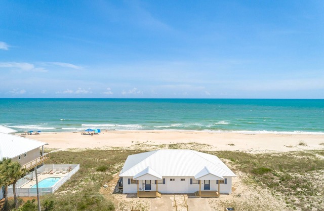 10% off Oct and Nov! Beachfront, 2bed/1bath, ground level, screened in porch.
