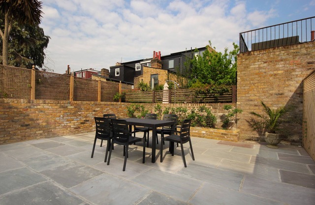 100m² Luxury Two-Bed Apartment in West London with large outdoor space.