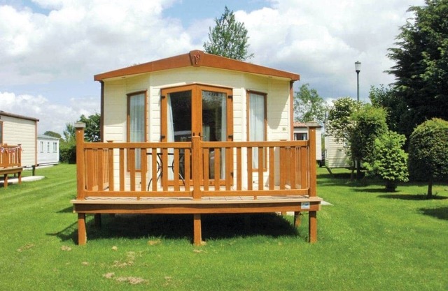 12ft-wide caravan with one double and two twin.