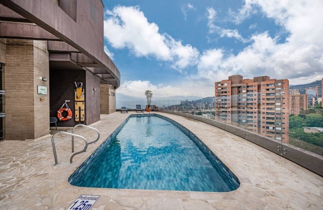 12th Floor 2BR Apt with City View & rooftop Pool