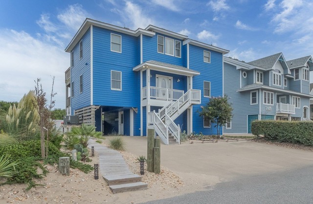 1861 - Into the Mystic, a spacious 6-bedroom oceanfront home in Corolla, NC.