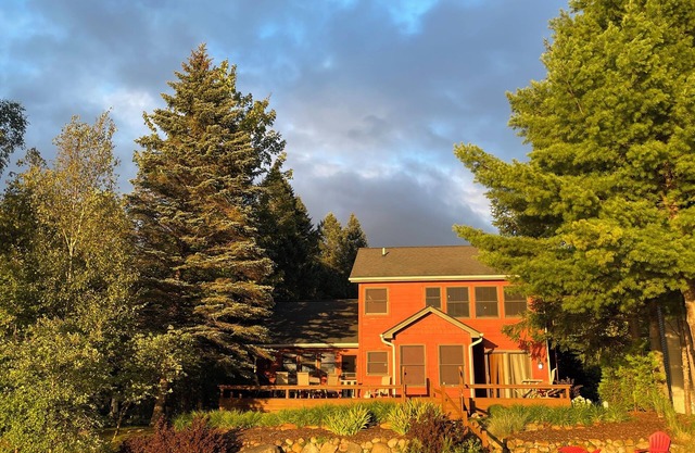 2+ Bed East Torch Lake with Rare Sandy Beach Frontage
