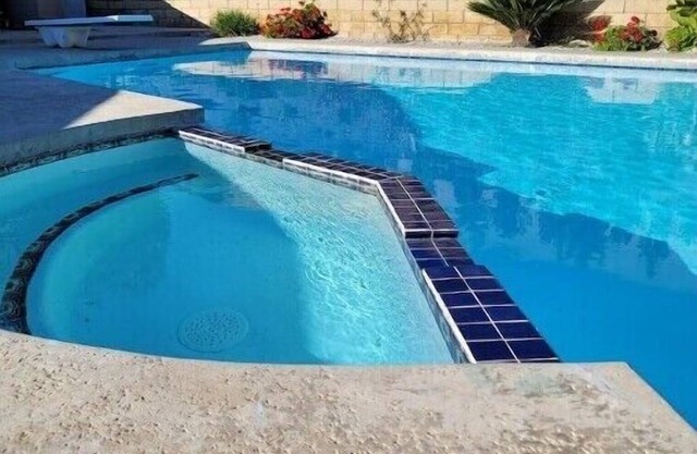 2 bedroom 1 bath private home with a Pooln