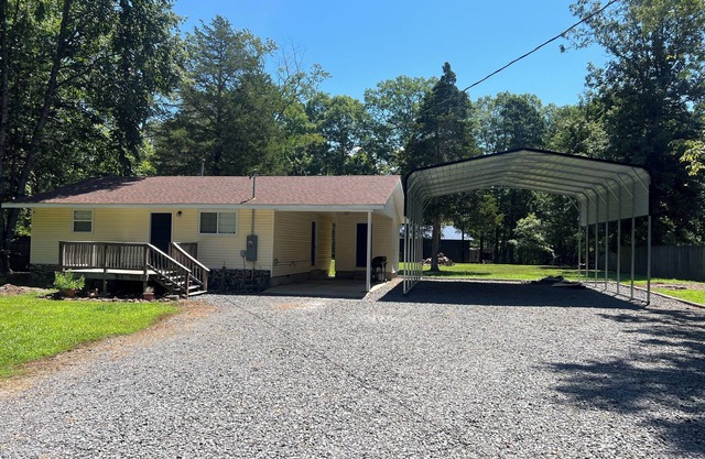 2-bedroom house in Higden with 24x30 covered parking for boats and lake toys!