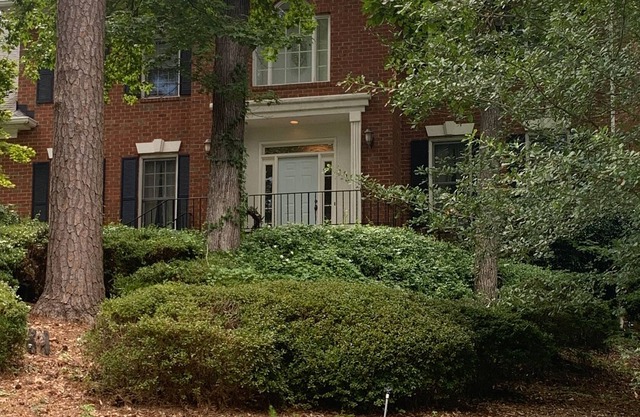 2-story home with grill, patio, outdoor dining, enclosed backyard, & fireplace