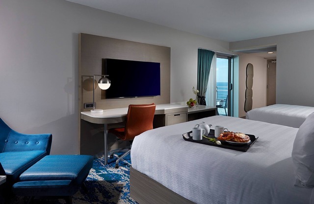 2 Units w/Relaxing City Views, Outdoor Pool, Beachfront Property!