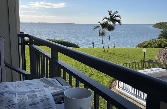 2nd floor condo overlooking pool with a beautiful bay view.