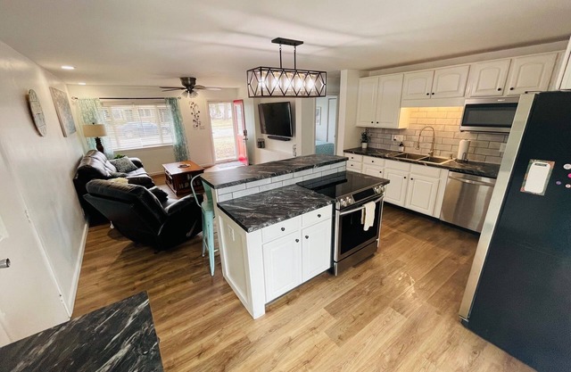 3 bedroom 1.5 bath house. Walkable to BSU and many restaurants, ping pong table