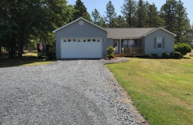 3-bedroom house in charming Jackson Springs. Not to far from the course.