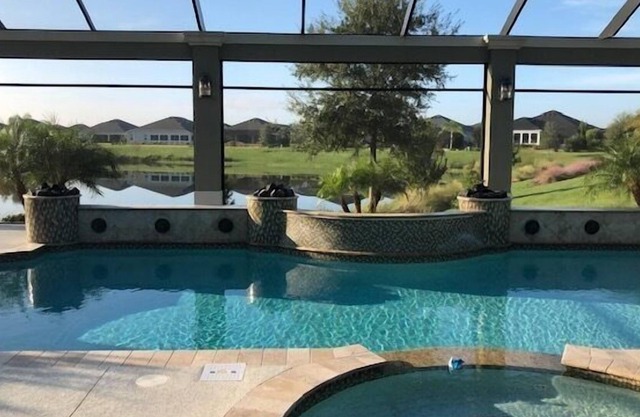 3 BEDROOM POOL HOME WITH AWESEOME VIEW ON LAKE OUTDOOR KITCHEN THE VILLAGES
