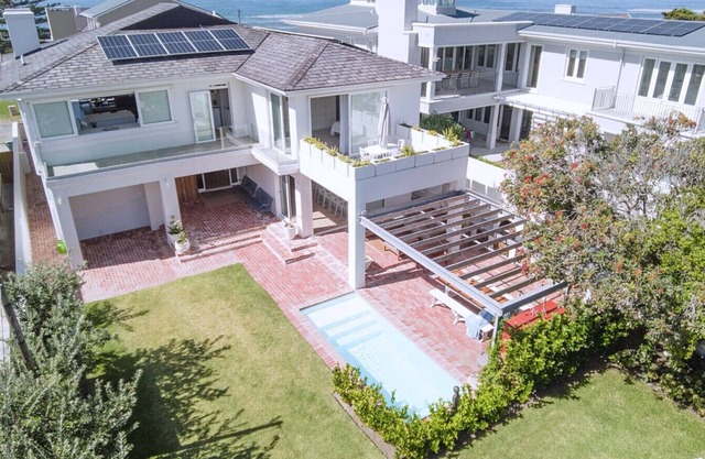 34 Mossel River 12 — Elegant Coastal Retreat | Ocean Views | Poolside Luxury