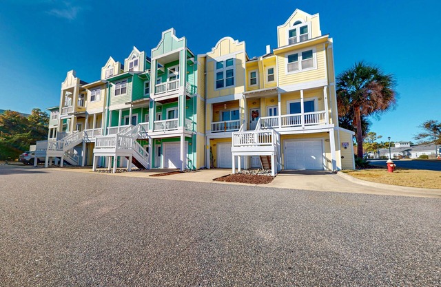 3BR coastal retreat with pool, gym, W/D, & balcony