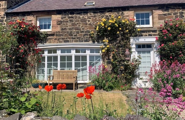 4 bed cottage with parking and views in Craster