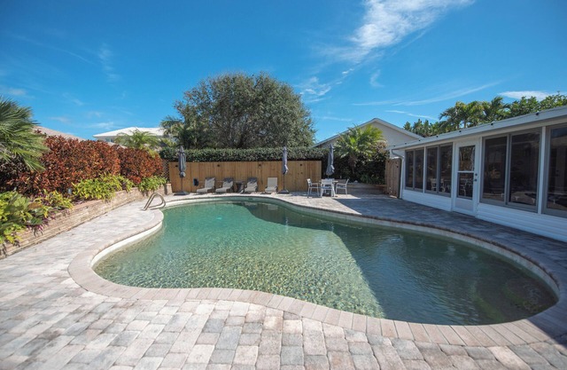4-bedroom house in Melbourne Beach w/heated pool and only steps to the beach