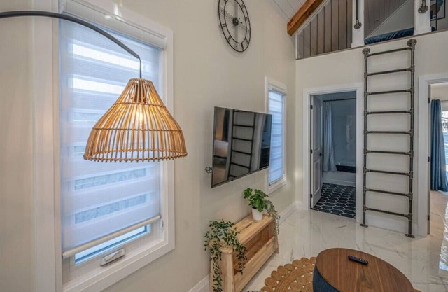 48H-3 · Kingsdale Designer Tiny House with Tesla Charger