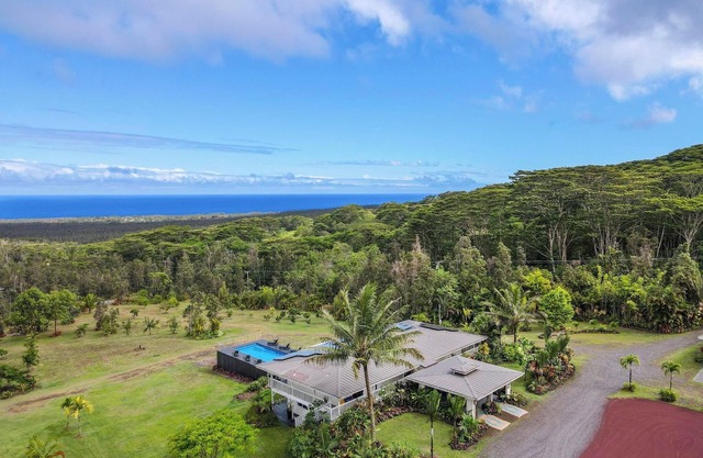 5-Acre Gated Retreat – Heated Pool & Spa, Horses, Orchard & Sweeping Ocean Views
