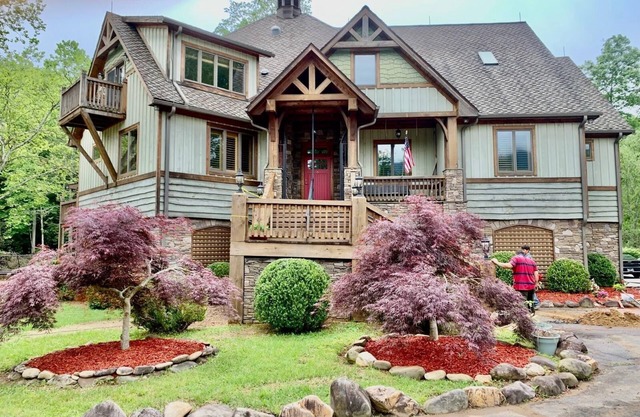 6 bedroom 5 bath house on 7 acres along the South Toe River near Asheville