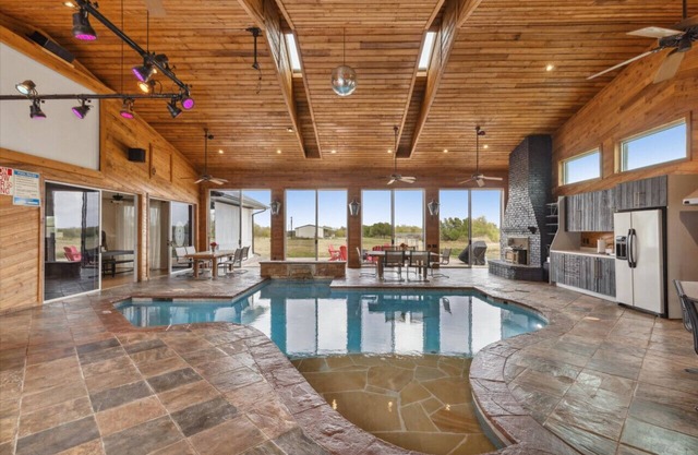 6000 SQFT Estate w/TX Shaped Indoor Pool + Game Room & Separate Guest House