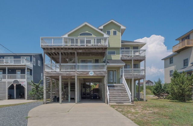 7170- Endless Summer Nights, a 4BR/4BA Waves, NC home for up to 8 guests.