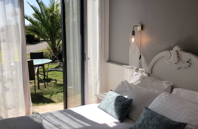 A 2 bedroom gite sleeping 4 plus a cot with access to a heated covered pool.