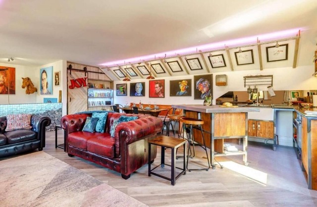 A beautifully appointed apartment featuring lots of original artwork.