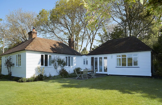 A charming, detached, weather-boarded cottage, set in a secluded location on the edge of the histori