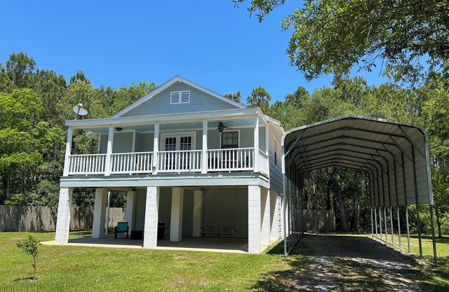 A Coastal Charm indeed. Porch Swings, Sea Breezes & Southern Ease