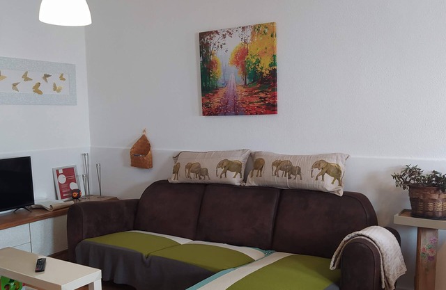 A cozy family home with a private patio. Excellent location, 1 km from the A8.