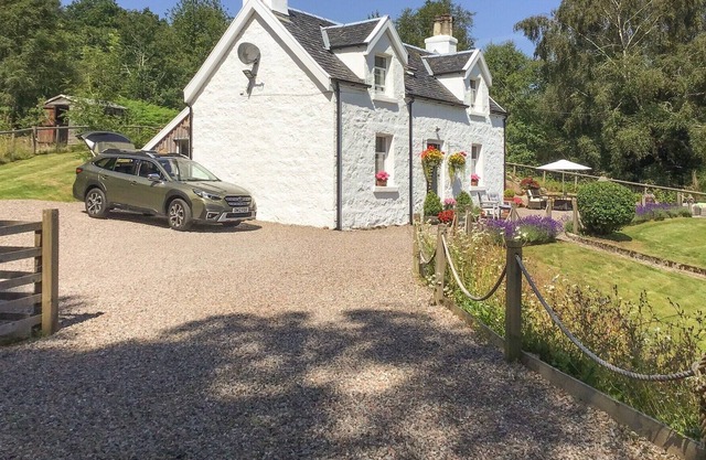A delicate white washed traditional croft house situated in the stunning West Coast of Scotland.