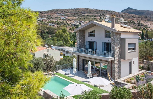 A fabulous brand new villa literally a splash away from the sea.