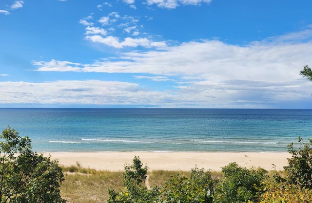 A-frame cottage with an A+ view of your own Lake Michigan beach