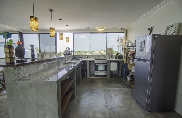 A home away from home! Coliving building with private rooms and shared areas.