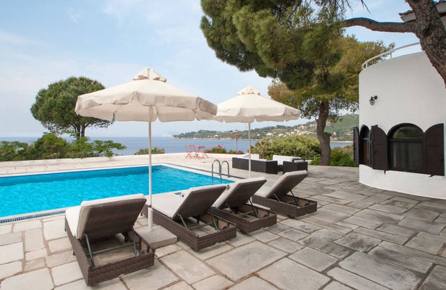 A large luxury villa, with guest house, pool and private beach