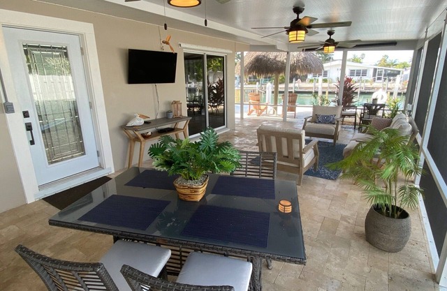 A piece of paradise! Adorable 2 bedroom, 2 bathroom canal front half duplex