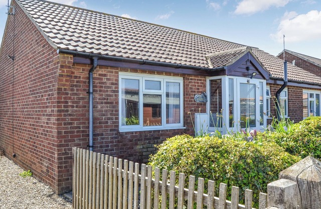 A short walk from long sandy beaches and pubs serving food.