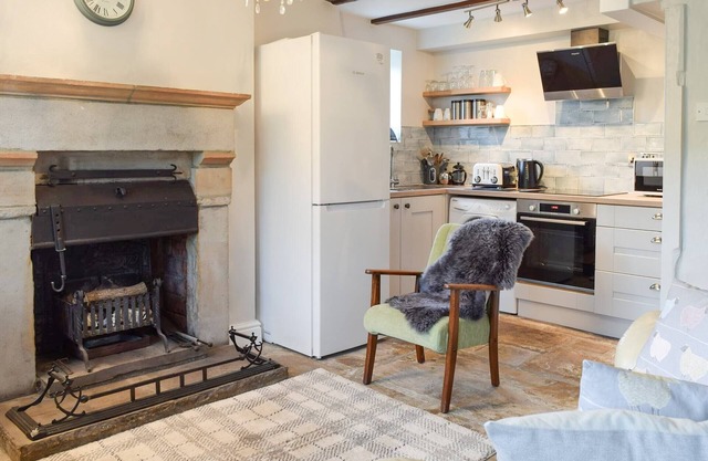 A south facing cottage situated in an elevated position within the traditional Yorkshire Dales villa