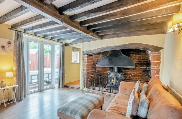 A spacious, bright property with a large inglenook fireplace and lovely furnishings.