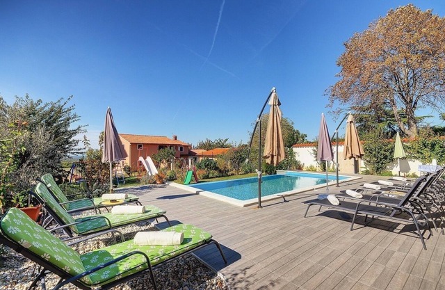 Above the Limfjord lies this Apartment with pool
